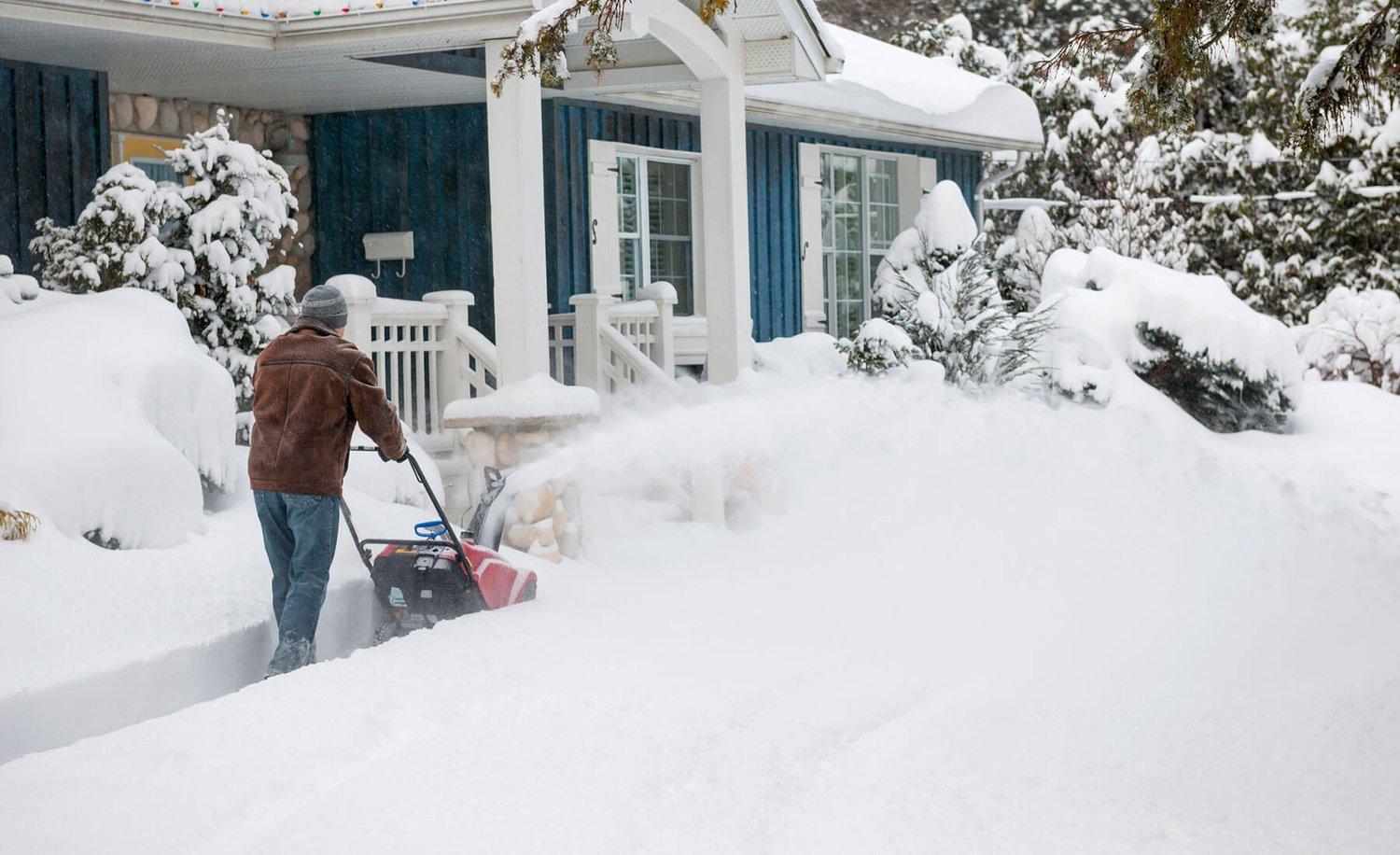 Professional snow removal process by GH Landscaping